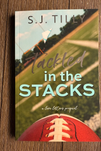 Tackled in the Stacks cover