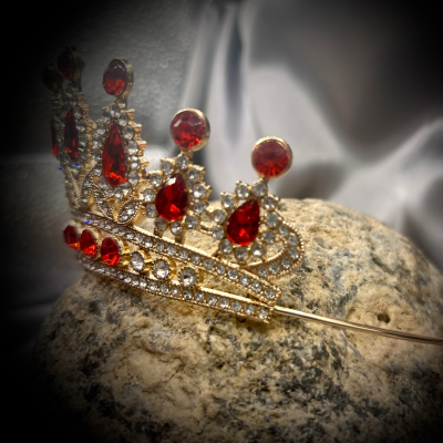Tiara with red faux jewels and clear rhinestones