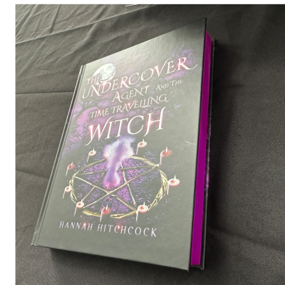 THE UNDERCOVER AGENT AND THE TIME TRAVELLING WITCH